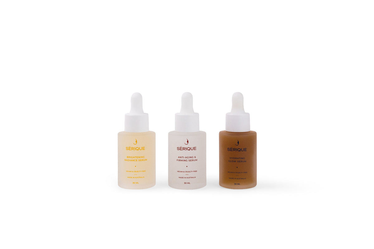 The Sérique Collection — three luxury serums arranged on white